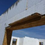 Large opening is bucked and strapped with wood