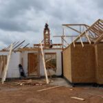 Wood trusses are added to the top of the house