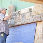 Applying stone finish to the exterior