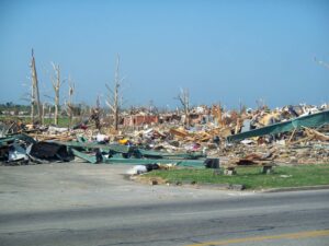 wood-frame home tornado damage