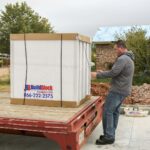 Unloading BuildBlock ICFs from the delivery truck
