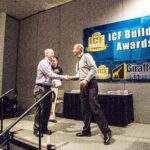 James Whitt accepts award