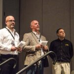Alfonso Nieves (BuildBlock) and Joel Johns (Green Built) accept award