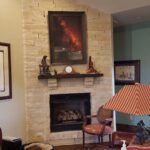 Living room with fireplace and artwork