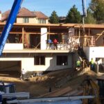 Crew works on the home after the ICF portion is completed