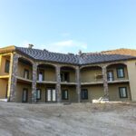 Back of house with finished stonework