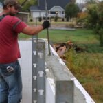 Vibrating concrete inside ICF walls